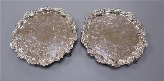 A pair of Victorian engraved silver waiters, Henry Holland, London, 1869, 20 oz.